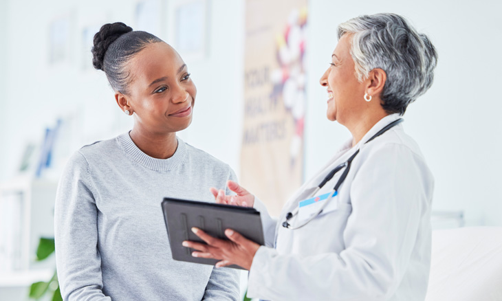 Bayhealth clinician with breast screening patient
