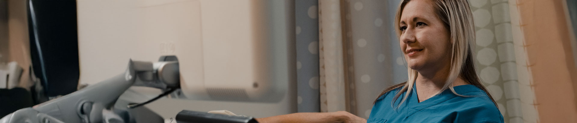 Ultrasound tech with a patient