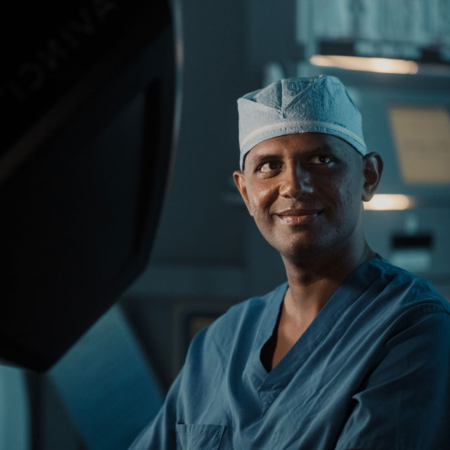 Physician in surgical scrubs